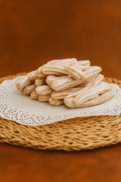 Churros Bañados en Chocolate Blanco